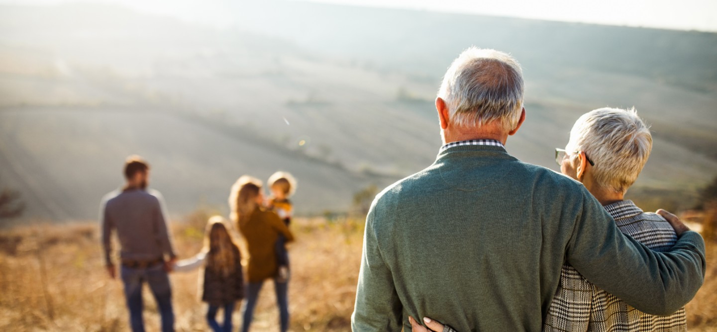 Retired couple with their family